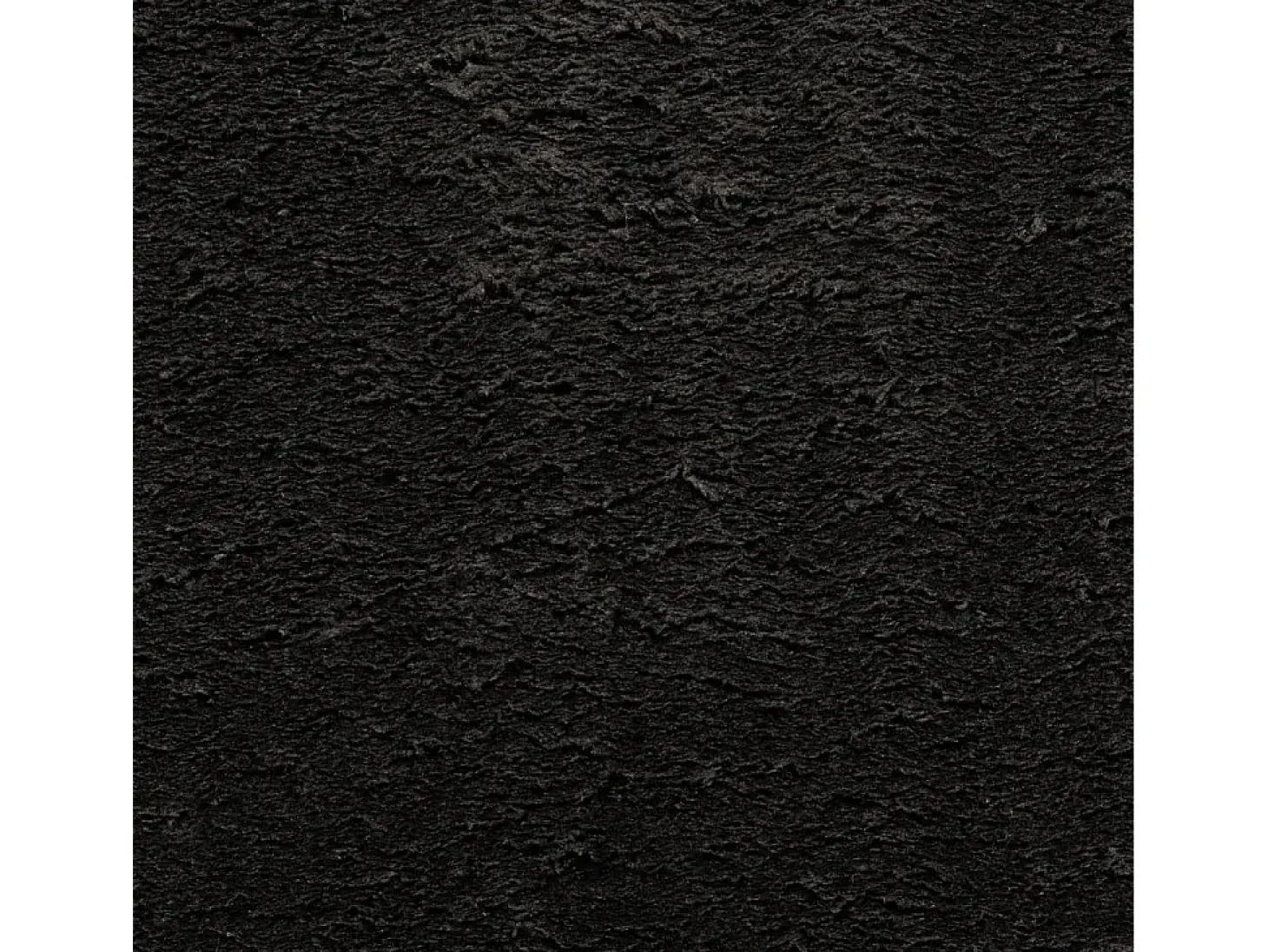 Alfombra HUARTE de pelo corto suave y lavable negra 100x200 cm