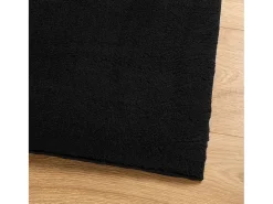 Alfombra HUARTE de pelo corto suave y lavable negra 80x200 cm