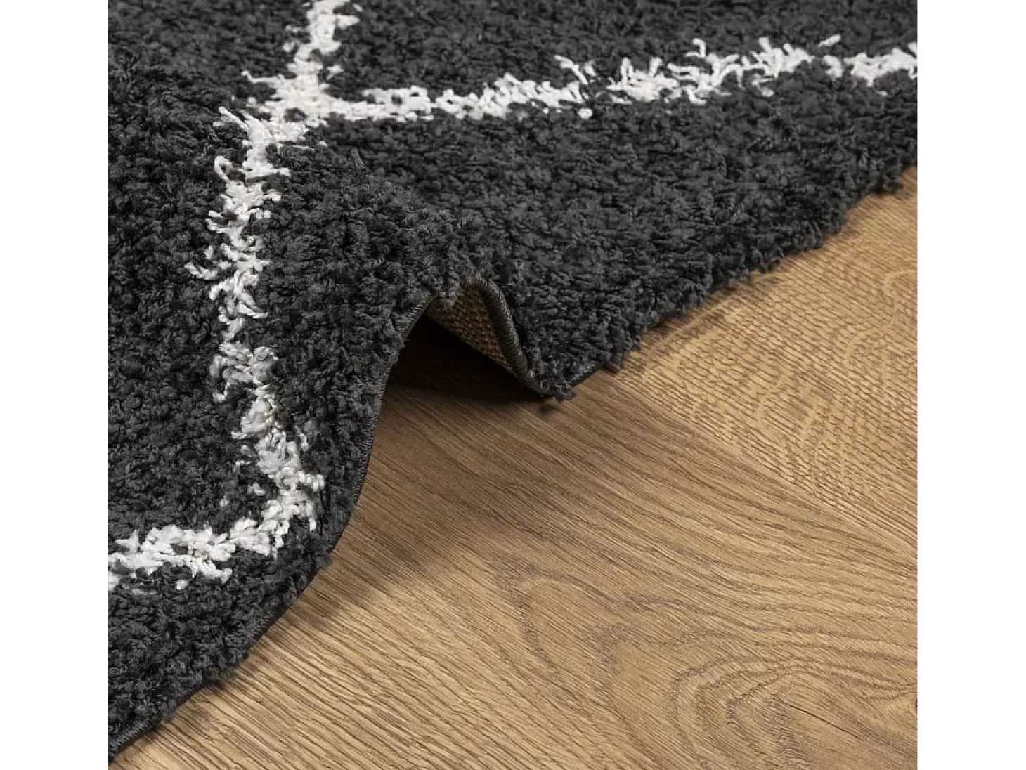 Alfombra moderna de pelo largo en color negro y crema de 200 x 280 cm
