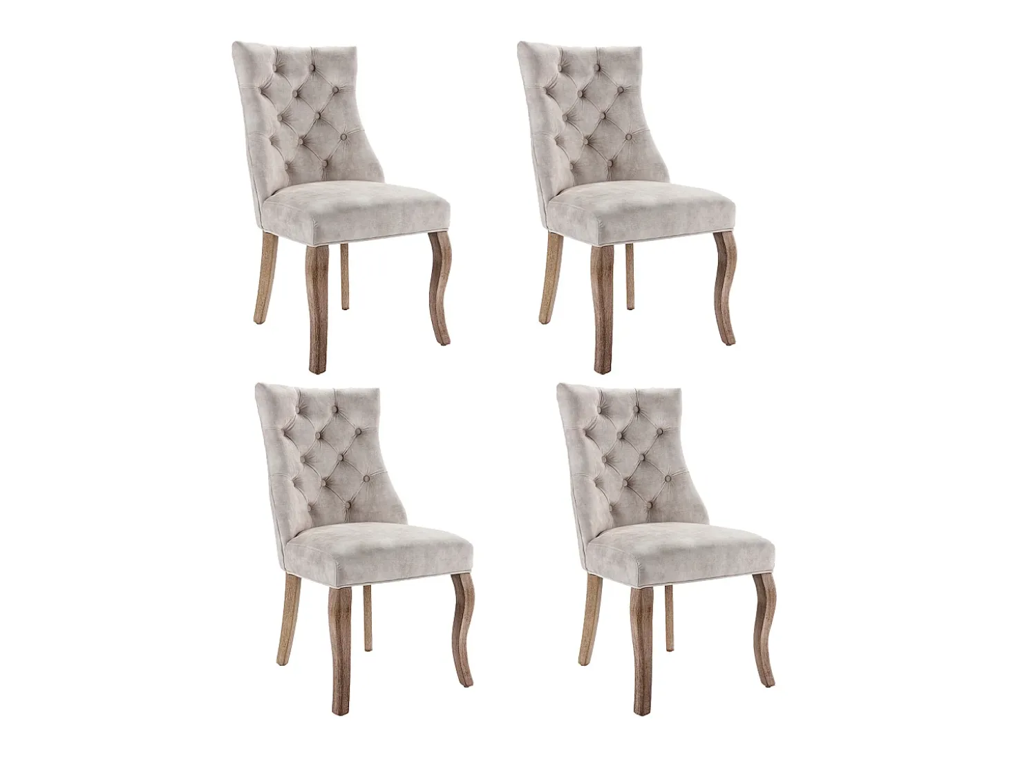 Conjunto de 4 sillas de terciopelo beige claro con patas de madera curvadas y botones decorativos.