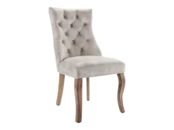 Conjunto de 6 sillas de terciopelo beige claro con patas de madera curvadas y botones decorativos.