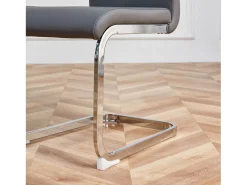 Juego de 4 sillas cantilever de PU gris con estructura de metal plateado