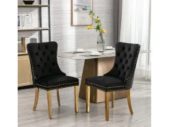 Juego de 2 sillas de comedor en terciopelo negro con respaldo acolchado y patas de metal dorado