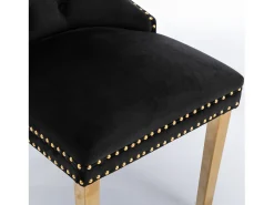Juego de 2 sillas de comedor en terciopelo negro con respaldo acolchado y patas de metal dorado