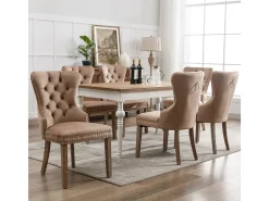 Juego de 6 sillas de comedor, tapizadas en terciopelo, con detalles de tachuelas y patas de madera maciza, color marrón.