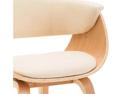 Juego de 2 sillas de comedor de madera curvada color crema y piel sintética.