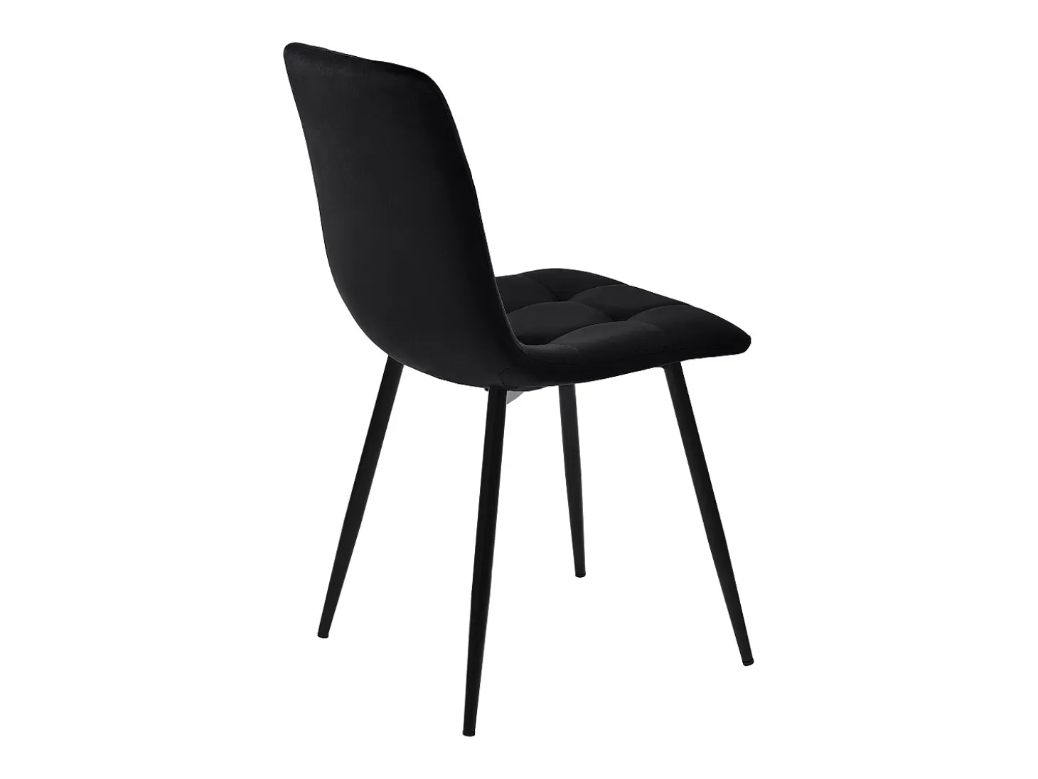 Juego de 4 sillas de terciopelo negro con patas de metal negro.