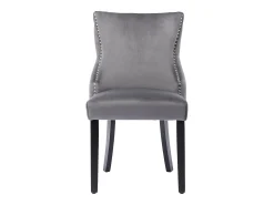 Juego de 4 sillas de terciopelo gris con patas de madera gris, botones decorativos y remaches plateados.