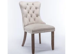 Juego de 2 sillas de terciopelo beige con capitoné y ribete tachonado, patas de madera