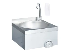 Lavabo de acero inoxidable con grifo y dispensador de jabón.