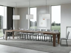 Mesa de comedor extensible de madera Kristo patas en V-Color Marrón-Base y soporte con ruedas-5 alargaderas finas-Ancho extensible