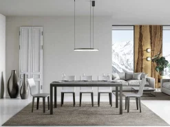 Mesa de comedor extensible Karry evolución-Color Gris cemento-Base y soporte con ruedas-Ancho extensible