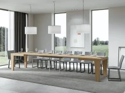 Mesa de comedor extensible de madera Kristo patas en V-Color Natural-Soporte 4 pies-5 alargaderas finas-Ancho extensible