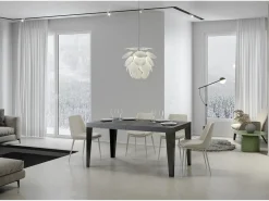 Mesa de comedor extensible Flavio-Color Gris cemento-Soporte 4 pies-5 alargaderas finas-Ancho extensible