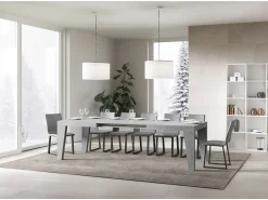 Mesa de comedor extensible de madera Naxo.-Color Gris cemento-Soporte 4 pies-5 alargaderas finas-Ancho extensible