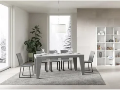 Mesa de comedor extensible de madera Naxo.-Color Gris cemento-Soporte 4 pies-5 alargaderas finas-Ancho extensible