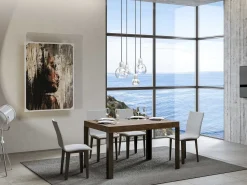 Mesa de comedor rectangular Liva 130 cm de madera oscura con patas de metal gris oscuro