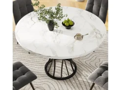 Mesa de comedor redonda para 4 personas con tapa chapada en mármol blanco y patas de metal negro.