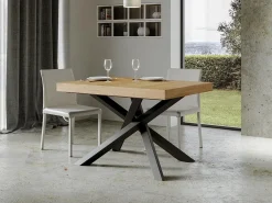 Mesa de diseño Artemis de 130 cm en madera clara con patas antracita entrelazadas