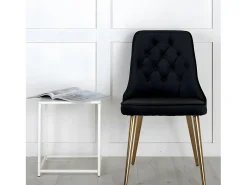 Silla de comedor VelvetDeluxe en terciopelo negro, decoración en latón.