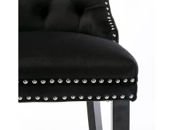 Taburetes de bar tapizados, juego de 2. Con remaches decorativos y patas de madera. Adornos cromados con remaches. Tapizado de terciopelo negro.